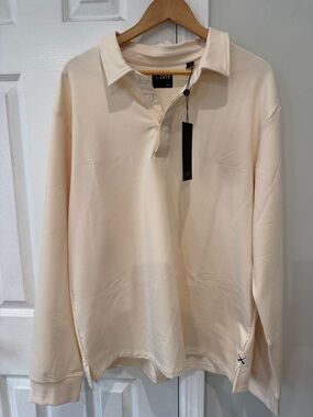 Cuts Long-Sleeve Polo Shirt in Light Cream